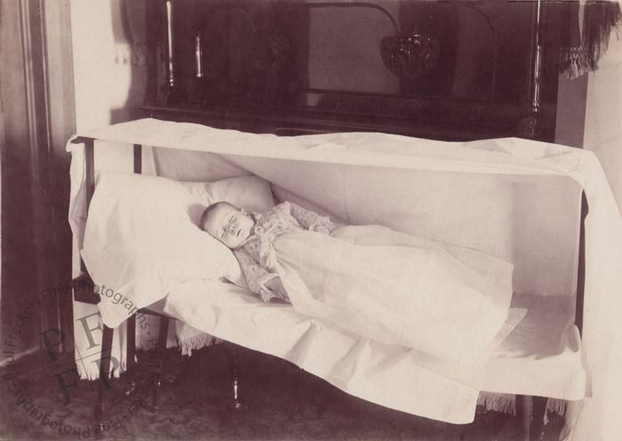 Baby on a cooling board