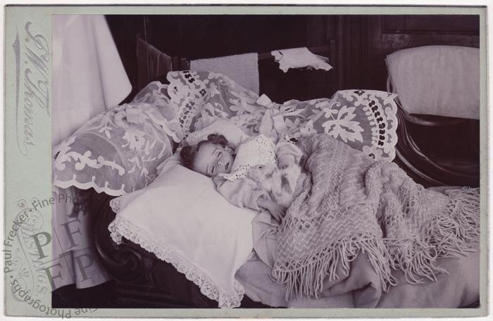 Child with a stuffed toy