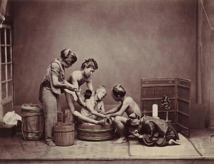 Washing the body of their dead father