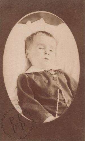 Boy with a rosary