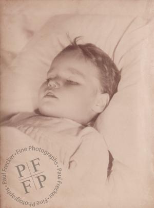 Boy with slightly open eyes