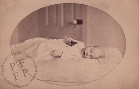 Baby with a posy
