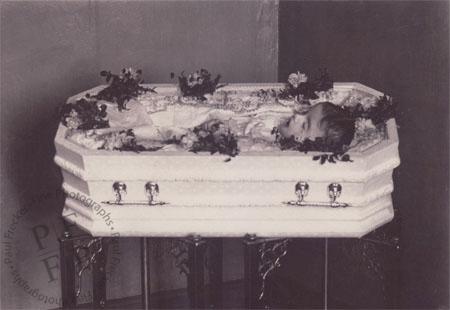Child in a white coffin