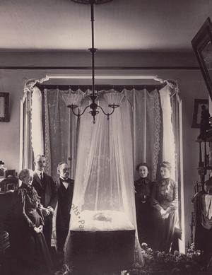 Mourners viewing a corpse