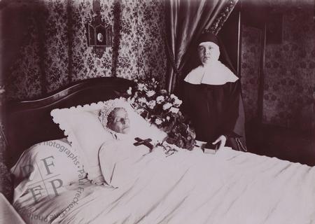 Elderly woman and a nun